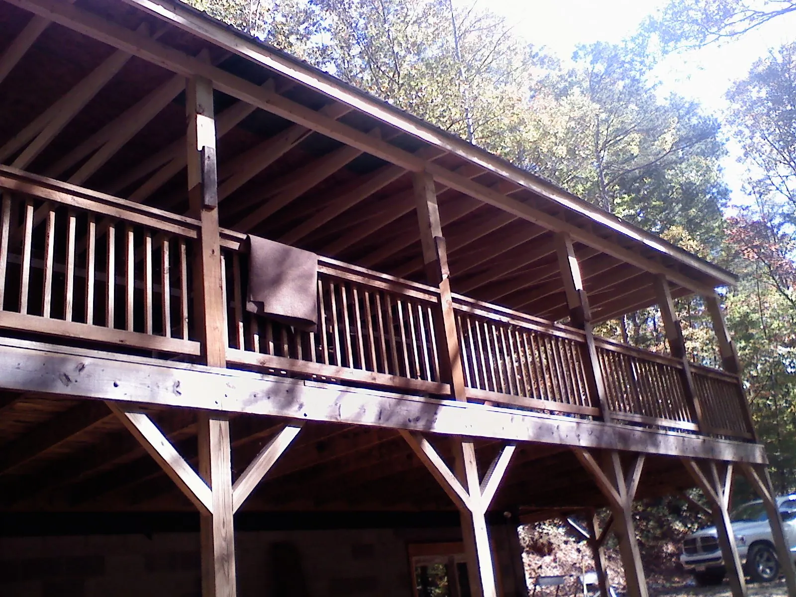 Timber framing under a new elevated porch and deck — Roof Leak Repair in Falmouth by Roofing Brothers